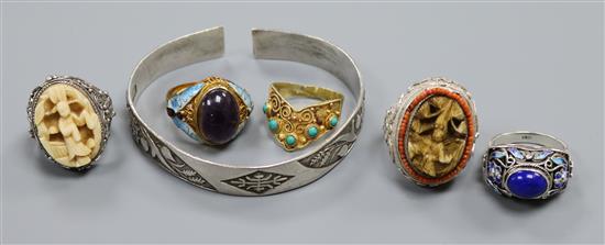 Five assorted white metal and gem set Peking rings including amethyst and ivory and a Chinese white metal bracelet.